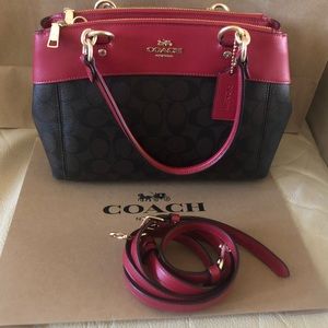 Coach red and brown with signature logo